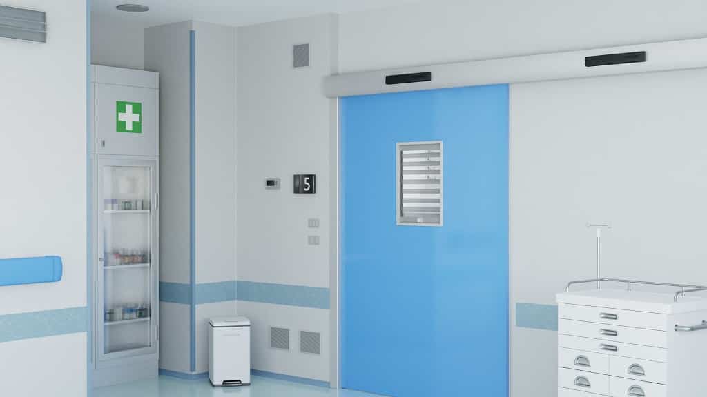 ScreenView integral blinds used in door vision panels in a hospital.